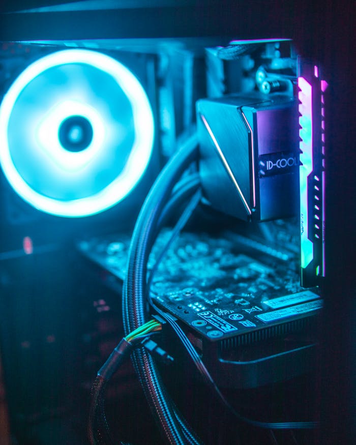 pexels photo 16062772 Vibrant RGB lighting on modern computer hardware components inside a desktop.